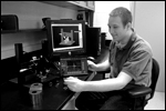 Eric Hauck demonstrates a fixture designed for the nondestructive evaluation of green-parts. The fixture is based on the fundamental theory of Raleigh Surface Waves.